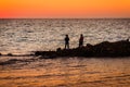 Fishermen In Soft Sunset Royalty Free Stock Photo