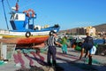 Fishermen sorting nets, Spain.