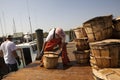 Fishermen stacking the crab pots in the harbour