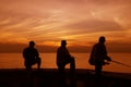 Fishermen at sunset Royalty Free Stock Photo