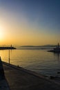 Fishermen at sunset in Alimos marina in Athens, Greece Royalty Free Stock Photo