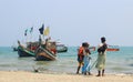 Fishermen and their colorful fishing boats. The fishing industry in Bangladesh. Bangladeshi traditional fishing boat. Royalty Free Stock Photo
