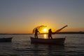 Fishermen throwing fishing net into the sea Royalty Free Stock Photo