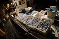 Fishermen unloading their cargo after fish