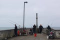 Fishermen Waiting on the Pier