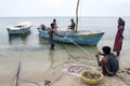 Fishermen and women attending to their nets on Delft Island in the northern region of Jaffna in Sri Lanka.