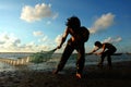 Fishermen working at the beach Royalty Free Stock Photo