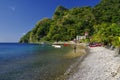 Fishermen working on the beach in the Soufriere village on January 06, 2017. Dominica Royalty Free Stock Photo