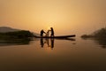 Fishermen are working on the fishing boat in Mekong River during in the morning Royalty Free Stock Photo