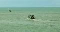 Fishermen at works on the wooden motor boat. Royalty Free Stock Photo