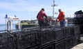 Fishermen Wrasse fishing pots on Fishing boat in Carnlough Antrim Northern Ireland 14-07-21