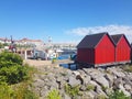 Fishermens wooden red cabins in harbor