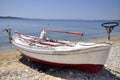 Fishers boat on coast Royalty Free Stock Photo