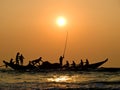 Fishers' boat in sunset Royalty Free Stock Photo