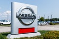 Fishers - Circa August 2018: Logo and Signage of a Nissan Car and SUV Dealership. Nissan is part of the Renault Nissan Alliance V Royalty Free Stock Photo