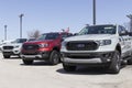 Ford Ranger pickup truck display at a dealership. The Ranger nameplate has been used on multiple Ford light duty truck models