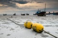 Fishery boat mooring bouy on the beach