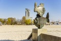 Fishes sculpture statue with beach in Gdynia