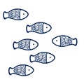 Fishes swimming together and one against the curren Royalty Free Stock Photo