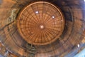 Fisheye bottom-up view of roof inside the old rusty storage tank