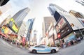 Fisheye lens photo of a NYPD patrol car.