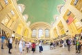 Fisheye lens picture of commuters in motion by the famous clock.