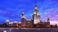 Fisheye panoramic evening view of nicely illuminated famous Russian university under dramatic sunset sky Royalty Free Stock Photo