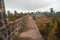 Fisheye shot of pathway above the walls of Arnala Fort, Maharashtra