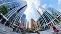 Fisheye shot of people wandering in the shopping area of Sanlitun amid COVID pandemic, Beijing China