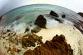 Fisheye shot of the rocky beach of the Perhentian Islands in Malaysia