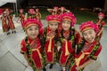 Fisheye shot of young students in chinese traditional costumes get together before their performance