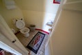 Fisheye view of a bathroom with the toliet seat up Royalty Free Stock Photo