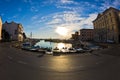 Fisheye view of boats, blue sky and sun reflection at Piran harbor, Istria Royalty Free Stock Photo