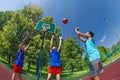 Fisheye view of children jumping for flying ball Royalty Free Stock Photo