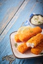 Fishfingers coated in golden breadcrumbs Royalty Free Stock Photo