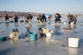 Fishing accessories on the river ice, Russia