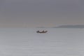 Fishing Adventures: Fisher in Small Boat at Sea in Tunisia, North Africa