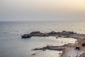 Fishing Adventures: Fisher in Small Boat at Sea in Tunisia, North Africa