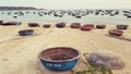 Fishing baskets on beach Royalty Free Stock Photo