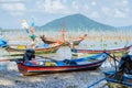 Wood Fishing Boat is Parking on the Beach.