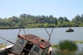 Fishing boat abandoned on shore in Reedsport, Oregon Royalty Free Stock Photo