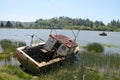 Fishing boat abandoned on shore in Reedsport, Oregon Royalty Free Stock Photo