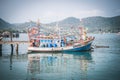 A fishing boat anchored at the Fisherman\'s Wharf, Ban Bang Saray