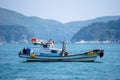 Fishing boat anchors in the bay near islands in South Korea. Royalty Free Stock Photo