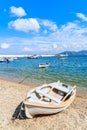 Fishing boat on beach in Kokkari village, Samos island, Greece Royalty Free Stock Photo