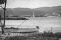 Fishing Boat by the beach in Montego Bay, and Marella Discovery 2 Cruise Ship docked in background. Royalty Free Stock Photo