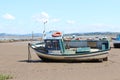 Fishing Boat on Beach at Morecombe Royalty Free Stock Photo
