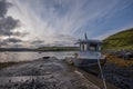 Fishing boat beached by slipway in Skye Royalty Free Stock Photo