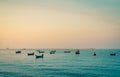 Fishing boat with beautiful sunset sky. Fishing boat anchored at Koh Kood, Thailand at dusk. Calm and peaceful concept. Thailand