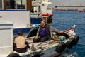 Fishing boat on the Bosporus,surrounded by seagulls in Turkey